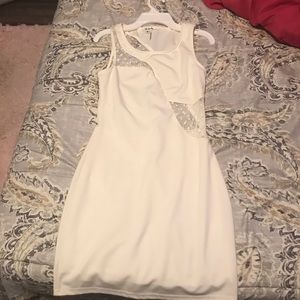 White short dress with mesh and polka dot cut outs